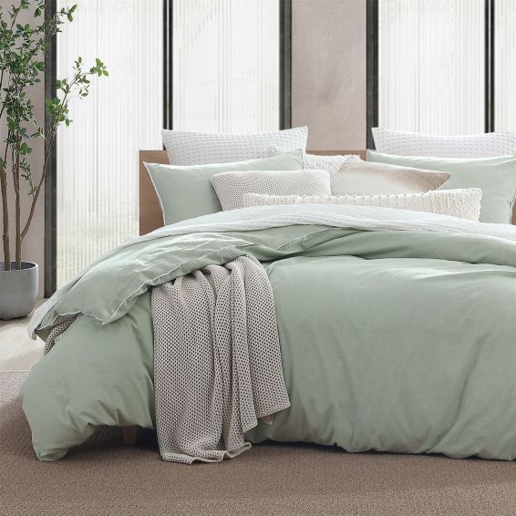 Emma Bolster Cushion by DKNY in Ivory White