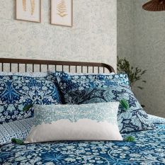 Strawberry Thief Bolster Cushion by Morris & Co in Teal Blue
