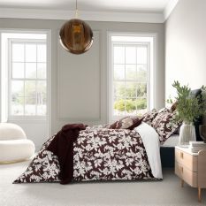 Aris Ikat Bolster Cushion by Bedeck of Belfast in Mulberry Red