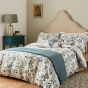 Andhara Designer Woven Throw By Sanderson in Teal Cream