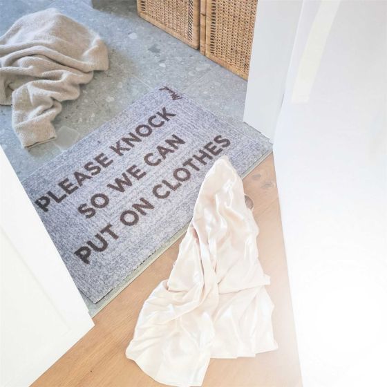 Carlos Please Knock So We Can Put Our Clothes On Washable Floor Mats in Beige
