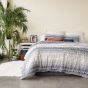 Yarn Dyed Tufted Stripe Bedding by Peri Home in Indigo Blue