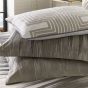 Motion Geometric Cushion by Morris & Co in Champagne & Steel