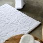 Brighton 100 Floral Bath Mats in White by Designer Abyss & Habidecor