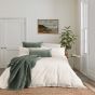 Aura Cushion by Bedeck of Belfast Rare Earth in Nettle Green